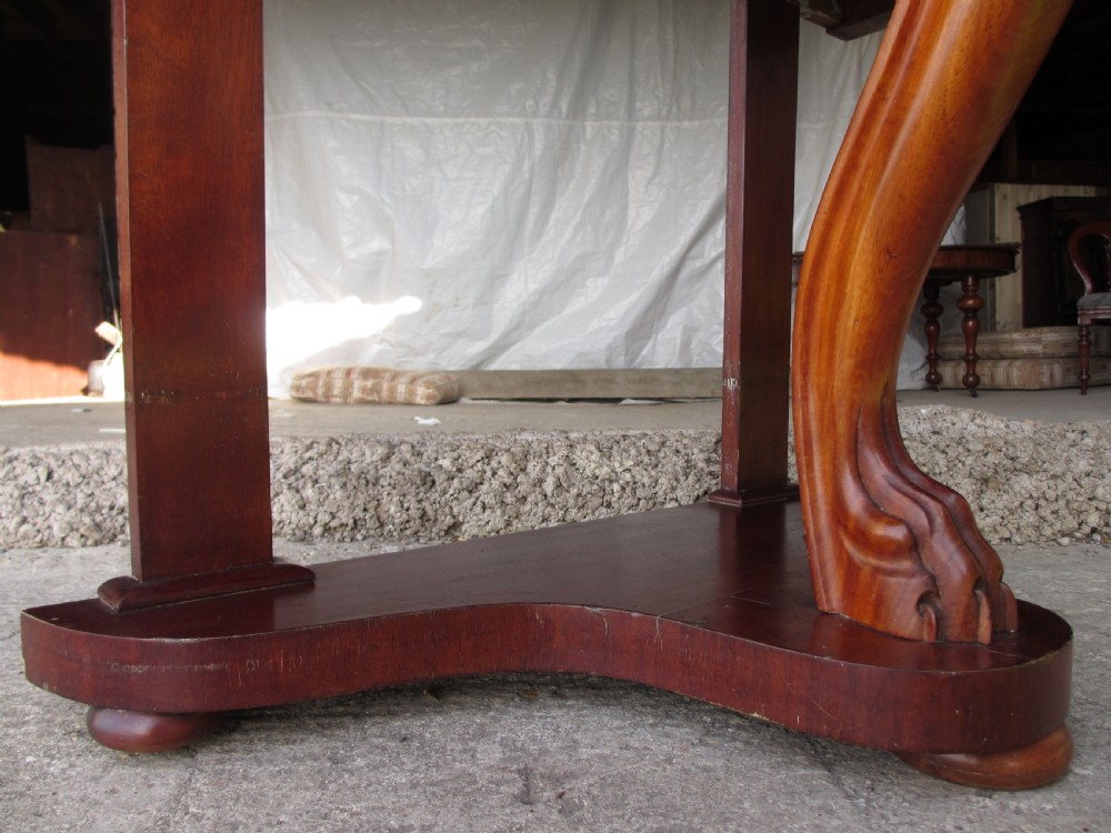 Victorian mahogany demi-lune dressing table featuring an arched swing mirror flanked by scrolled supports and a central carved cabriole front leg. View VII