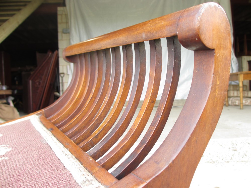 Edwardian mahogany cradle shaped piano stool with tapering legs View V
