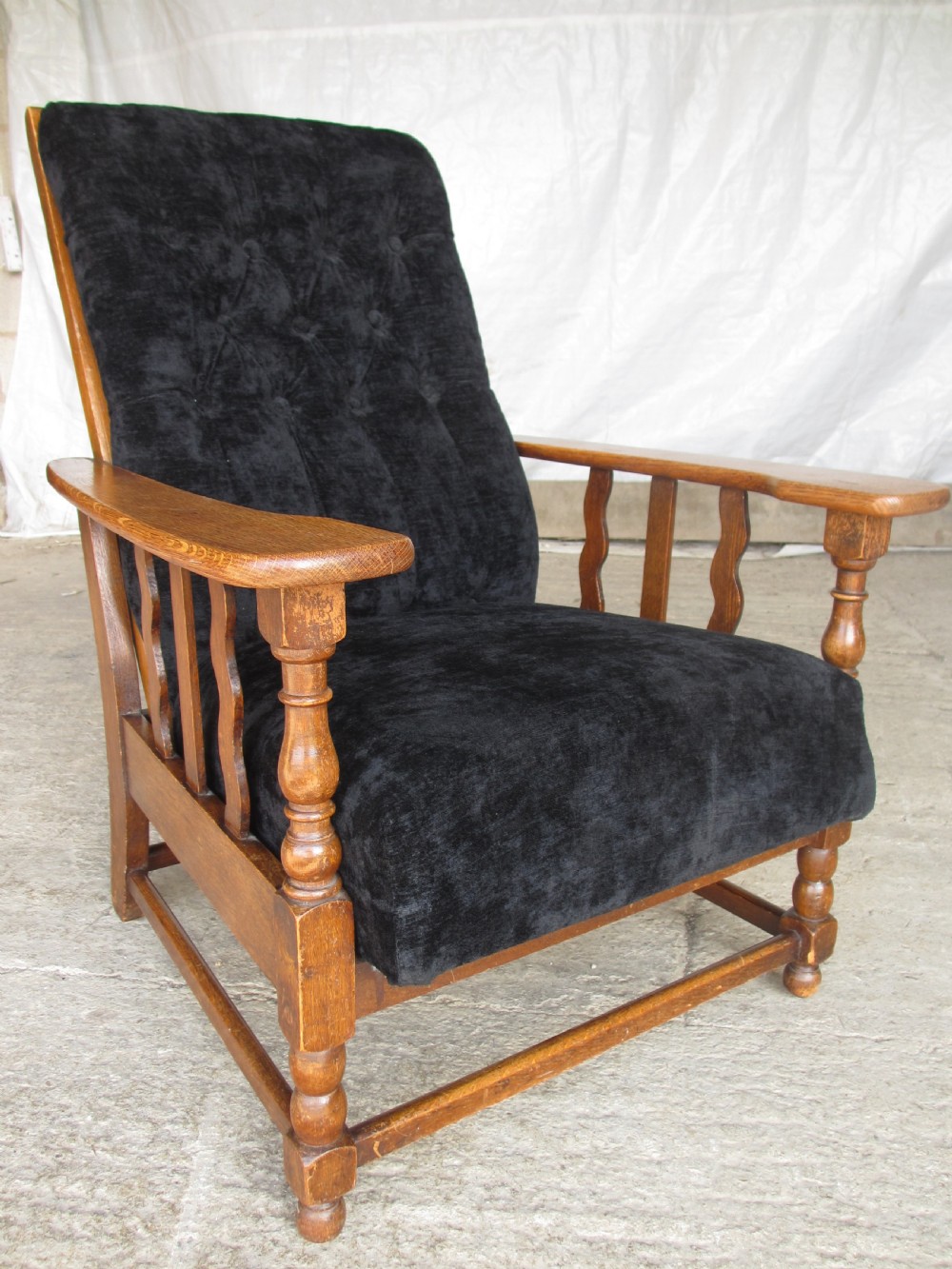A pair of Edwardian oak plantation style Art Deco adjustable lean back armchairs View III
