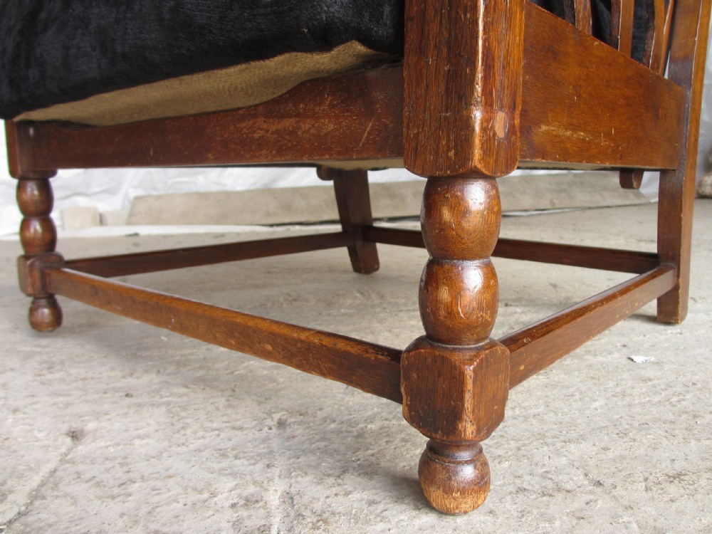 A pair of Edwardian oak plantation style Art Deco adjustable lean back armchairs View IX