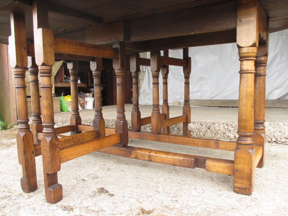 Early 20th century large golden oak wake oval drop leaf dining table View VIII