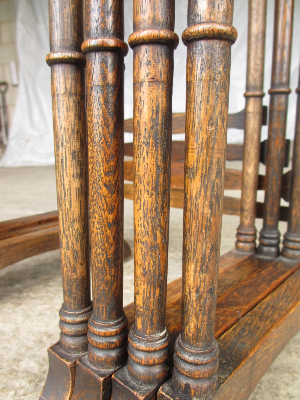 A set of four graduating nineteenth-century oak nesting tables with slender turned legs and rectangular tops. View IV