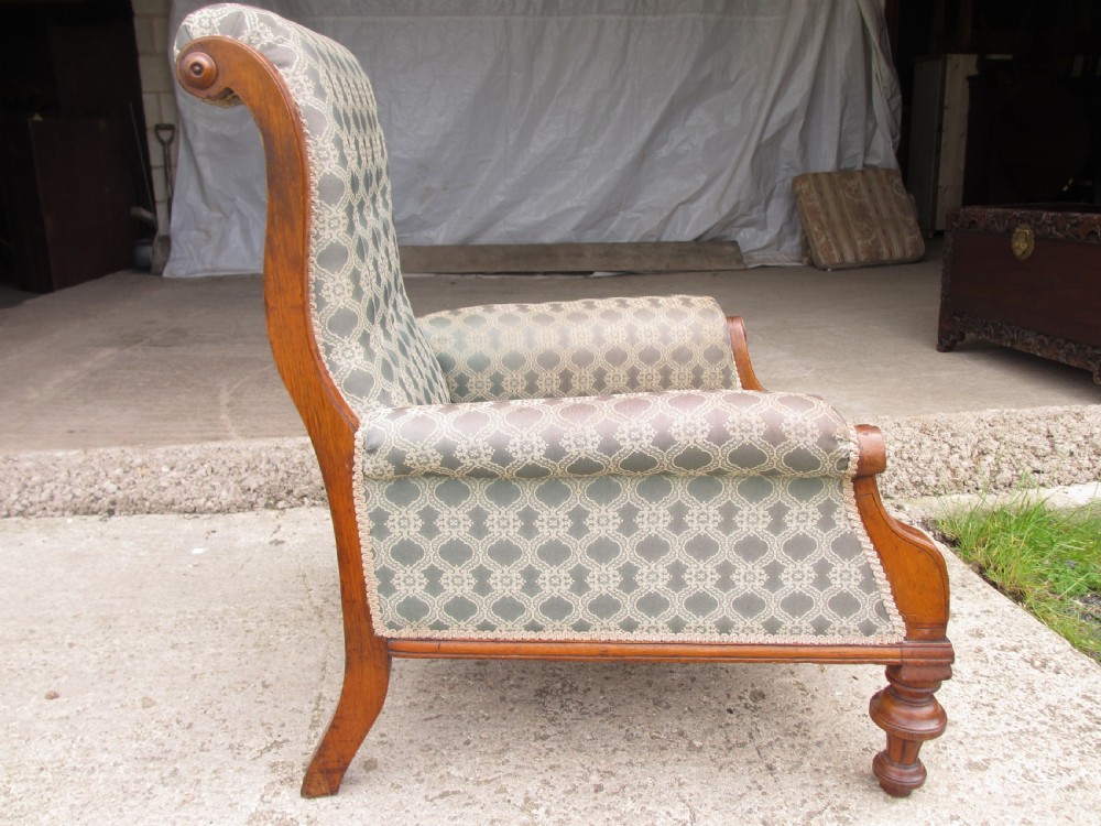 Victorian oak framed gothic style fully upholstered easy armchair View XI
