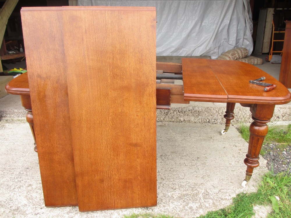 Victorian golden oak wind out extending dining table  View II