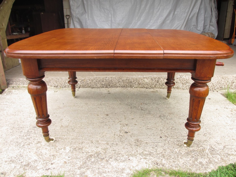 Victorian golden oak wind out extending dining table  View III