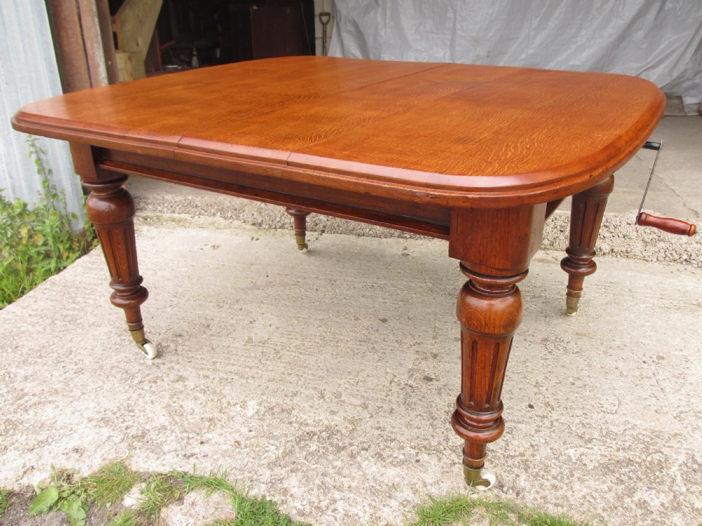 Victorian golden oak wind out extending dining table  View VIII