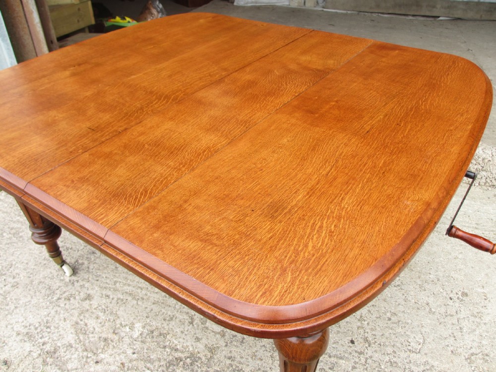Victorian golden oak wind out extending dining table  View VI
