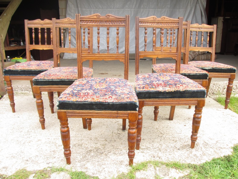 Set of 6 Victorian golden oak arts and crafts dining chairs View II
