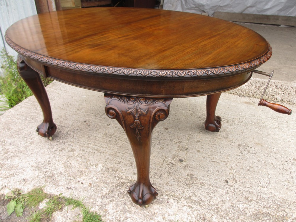 Edwardian mahogany oval screw extending dining table View IX