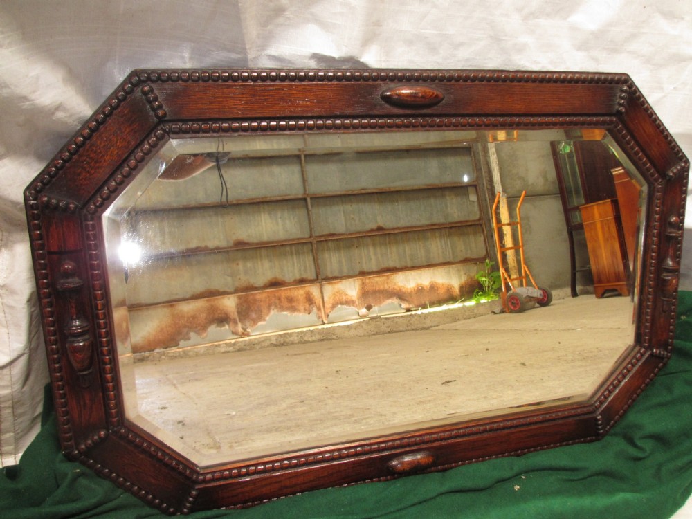 Victorian oak framed canted bevel edged wall hanging mirror