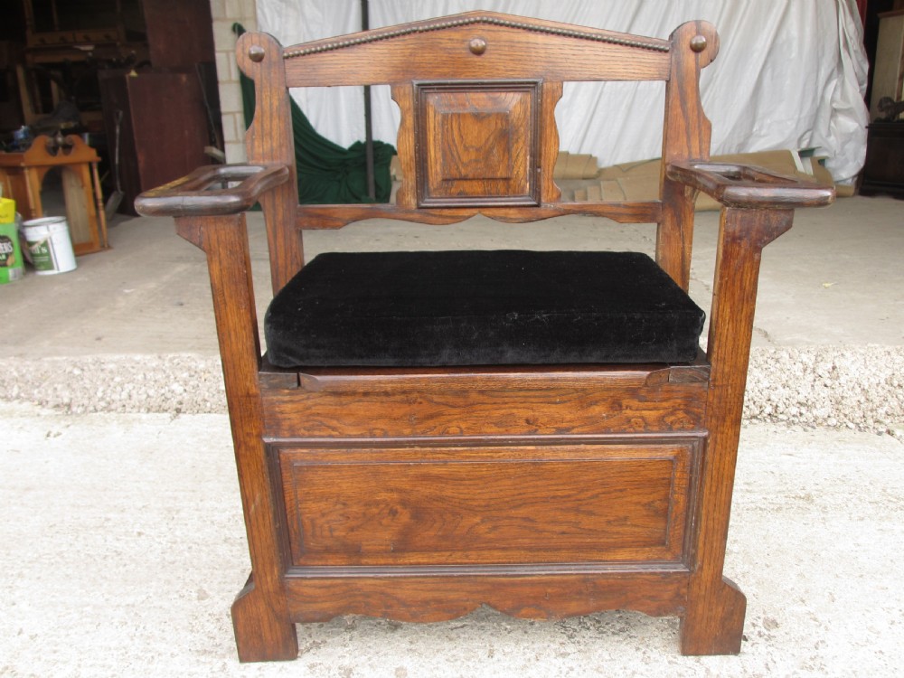 Victorian small oak hall settle with panelled back View II