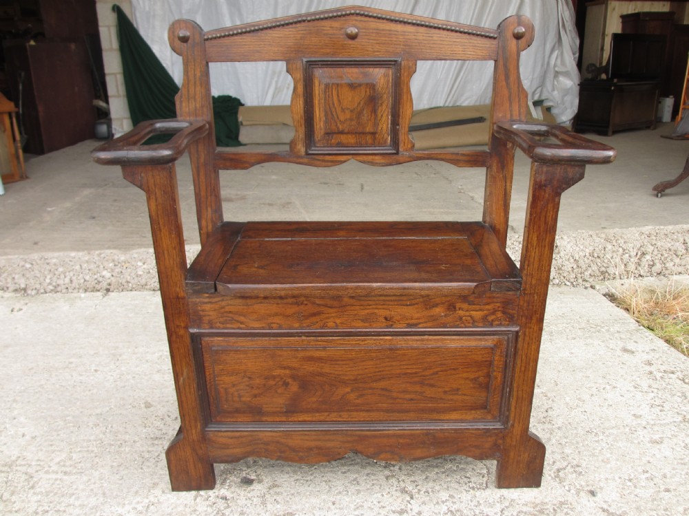 Victorian small oak hall settle with panelled back View IV