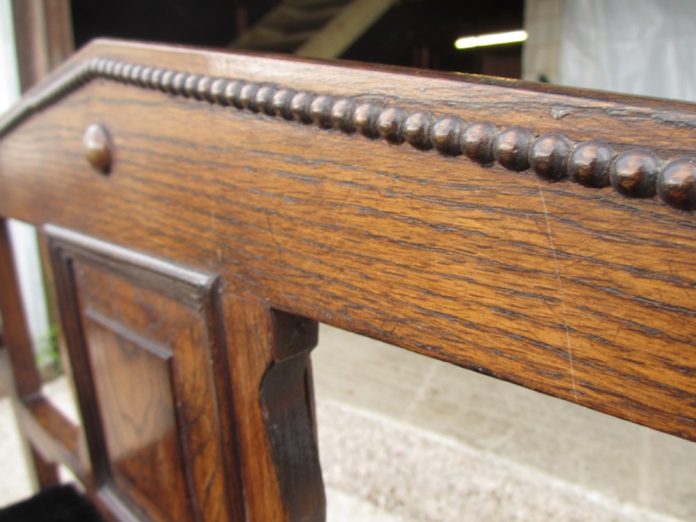 Victorian small oak hall settle with panelled back View VI