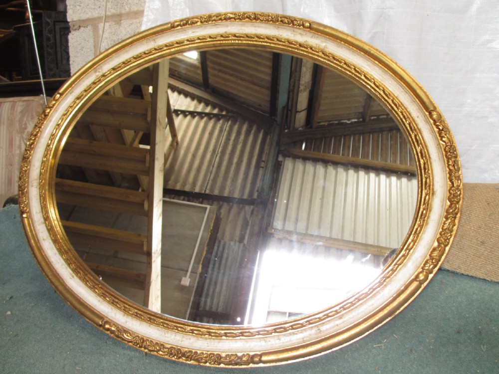 Victorian oval gilt and white framed wall hanging mirror View III