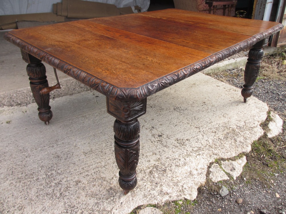 Victorian oak carved extending dining table View III