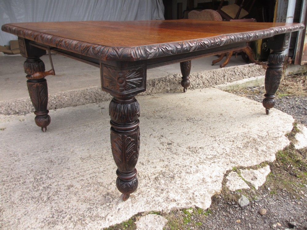 Victorian oak carved extending dining table