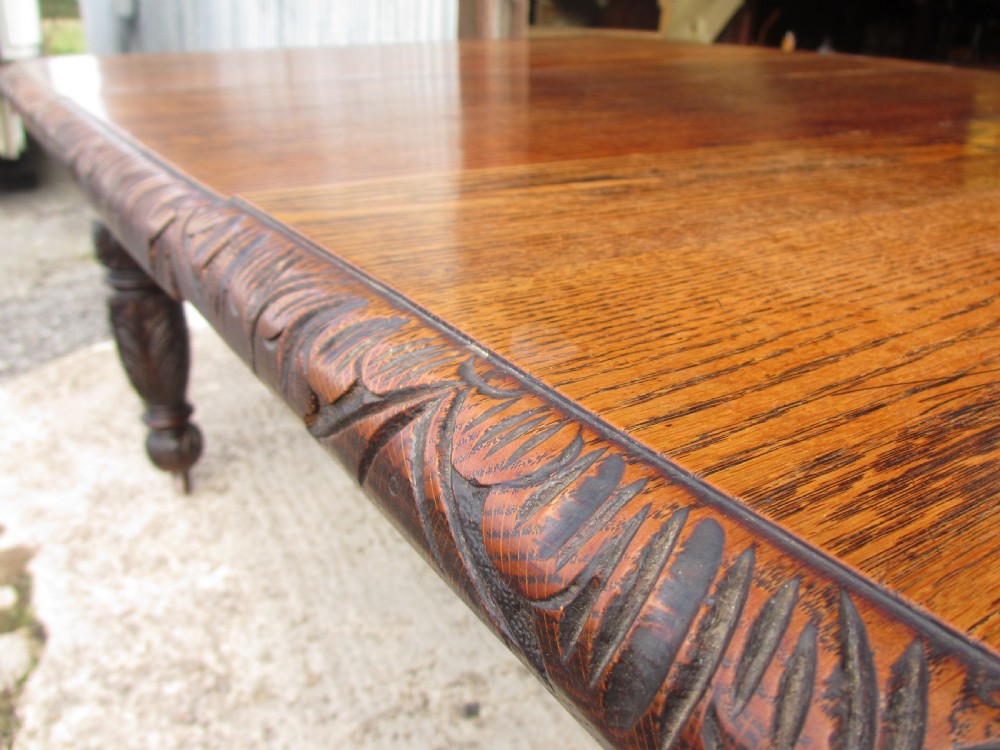 Victorian oak carved extending dining table View VI