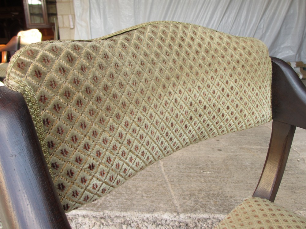 Unusual late 19th century set of six oak dining armchairs View V