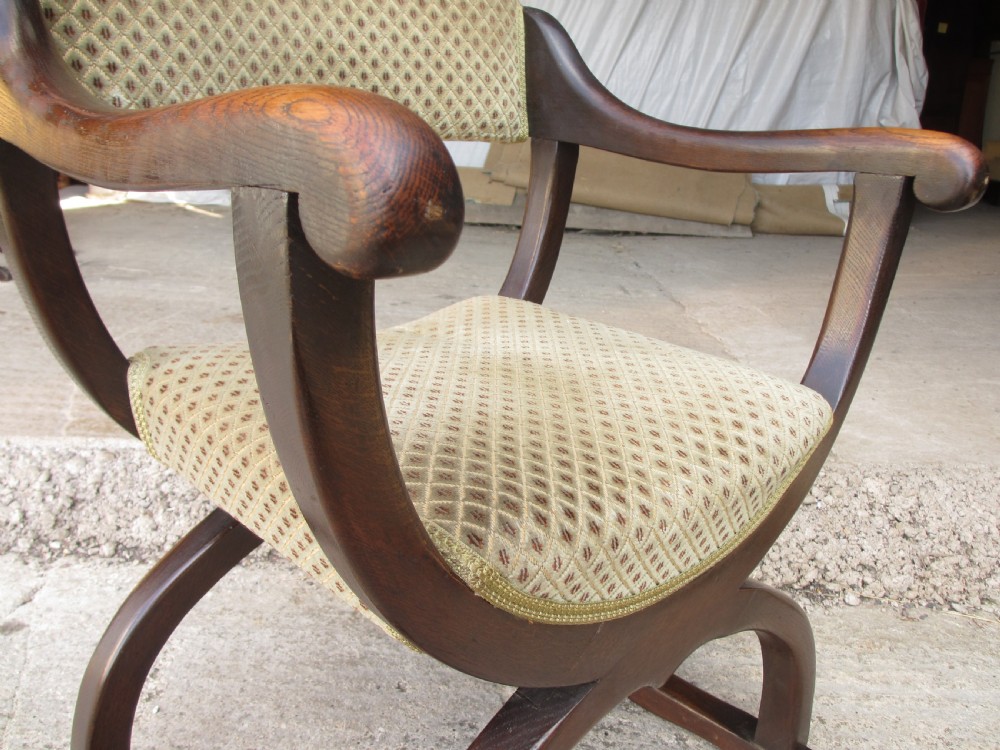 Unusual late 19th century set of six oak dining armchairs View VI