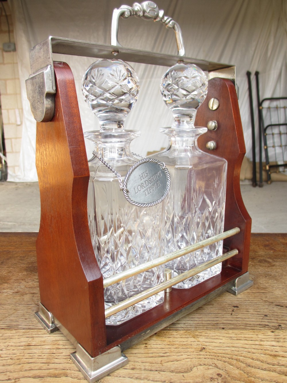 Edwardian 2 bottled Tantalus in a mahogany frame View III