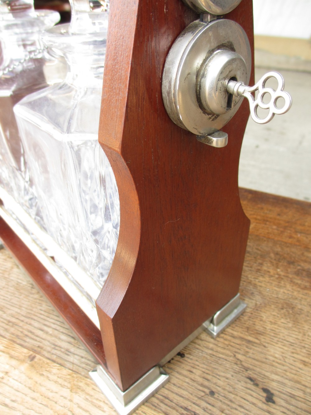 Edwardian 2 bottled Tantalus in a mahogany frame View VI