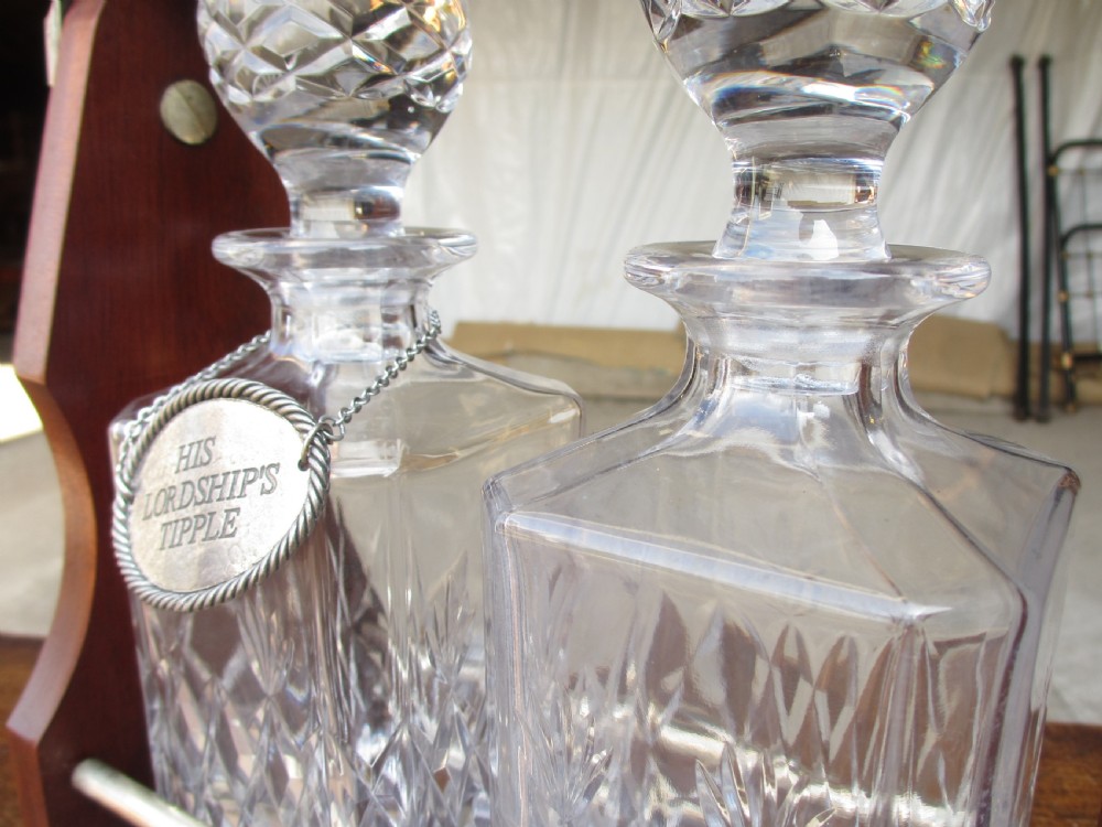 Edwardian 2 bottled Tantalus in a mahogany frame View VII