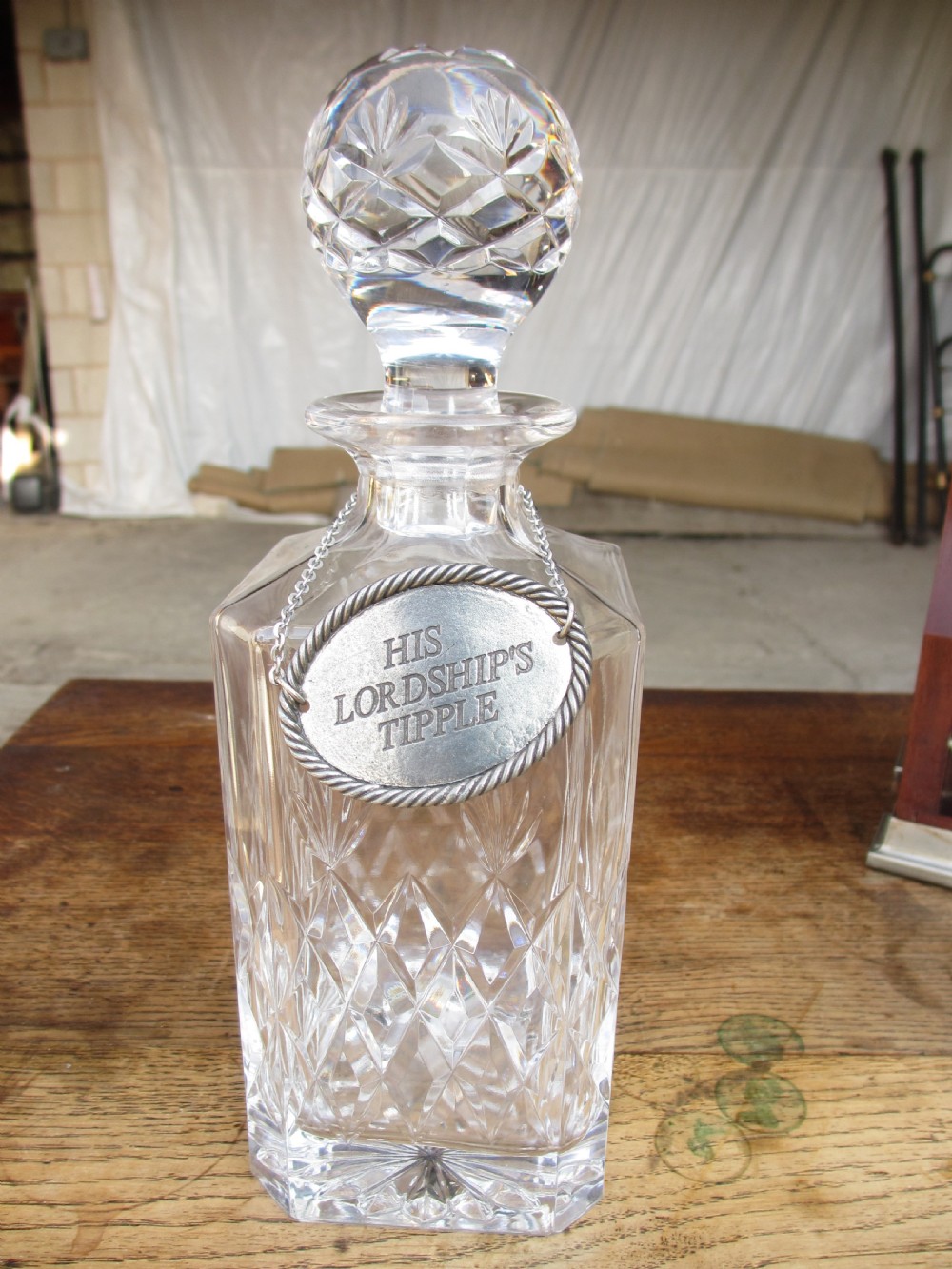 Edwardian 2 bottled Tantalus in a mahogany frame View IX