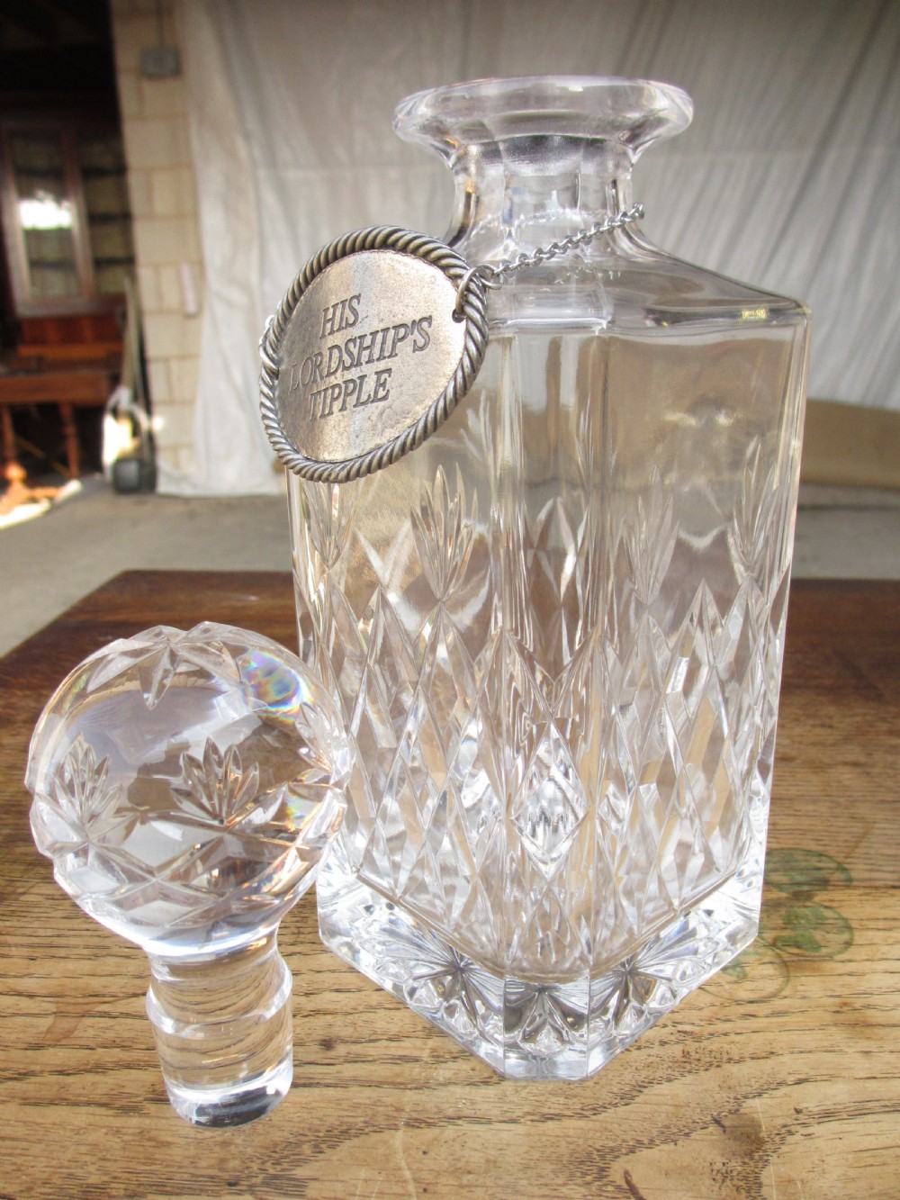 Edwardian 2 bottled Tantalus in a mahogany frame View X
