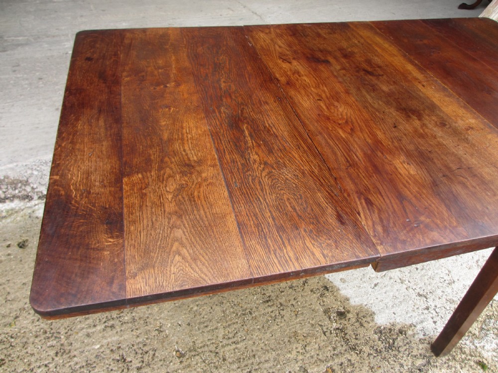 19th century oak rectangular twin leaf dining table  View IX