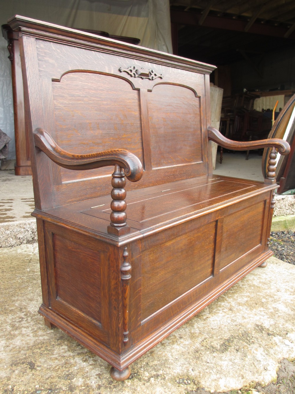 victorian oak panelled box settle with scroll and bobbin turned arms View II
