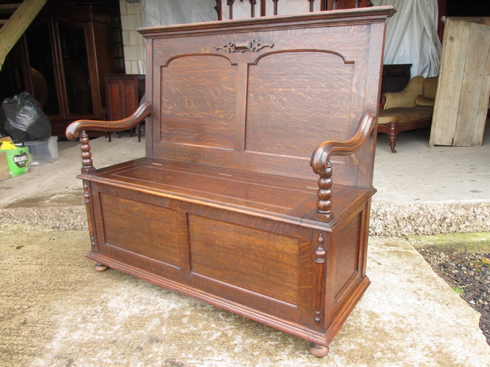 victorian oak panelled box settle with scroll and bobbin turned arms View III