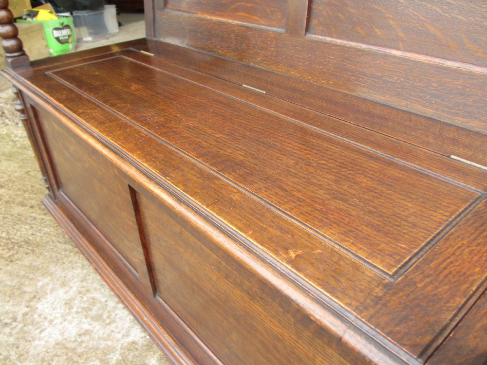 victorian oak panelled box settle with scroll and bobbin turned arms View VII