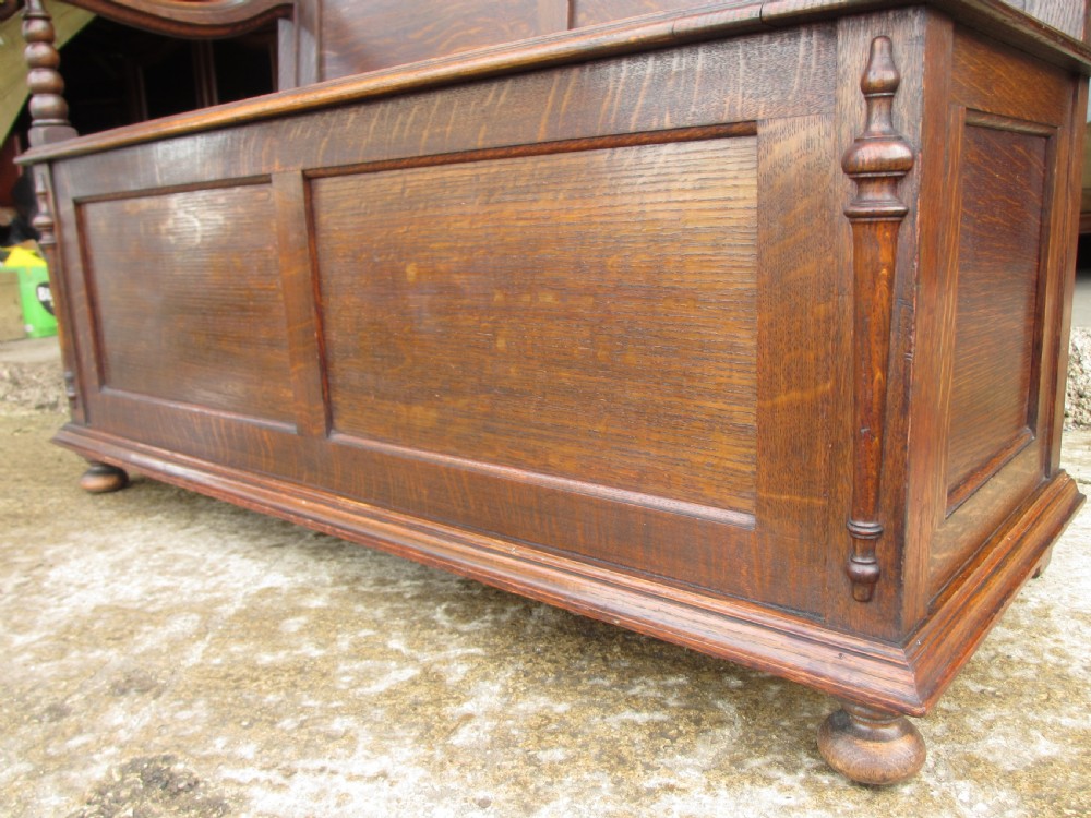victorian oak panelled box settle with scroll and bobbin turned arms View VIII