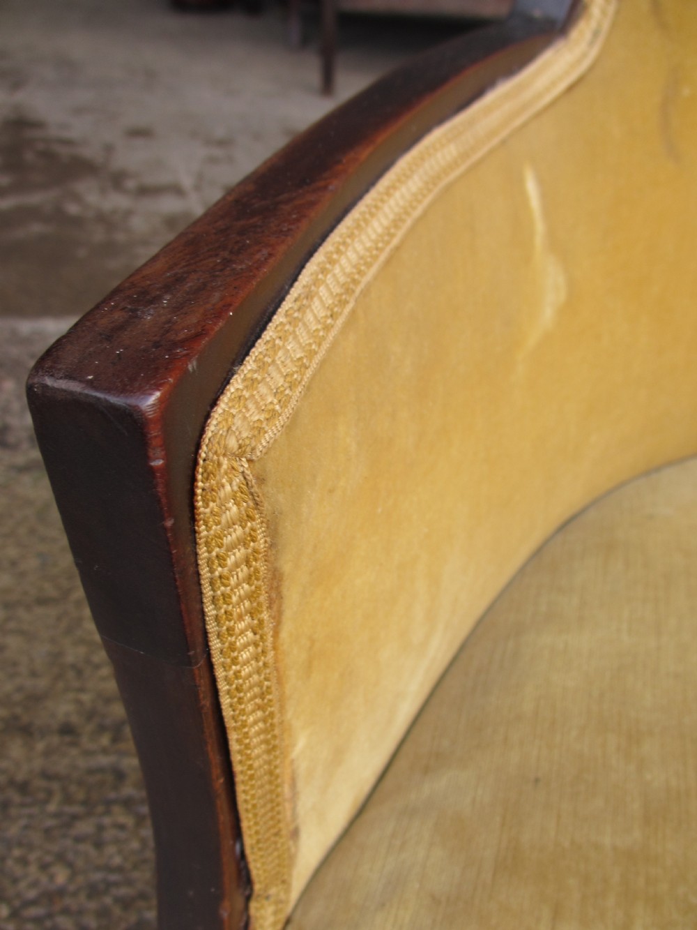 A 19th-century mahogany framed tub armchair featuring yellow velvet upholstery and square tapered legs. View IX