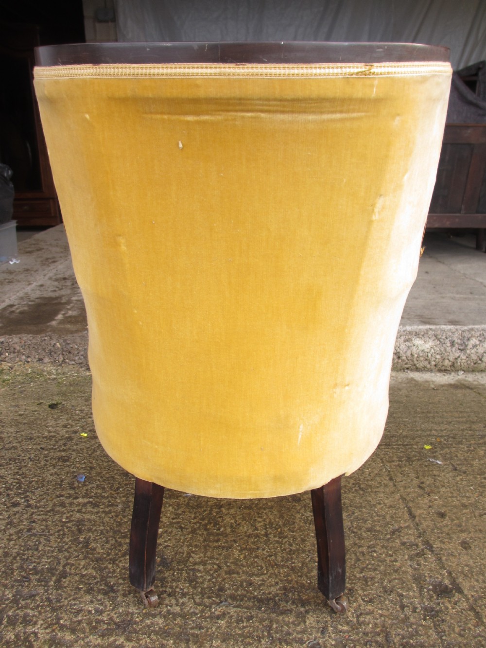 A 19th-century mahogany framed tub armchair featuring yellow velvet upholstery and square tapered legs. View XIV