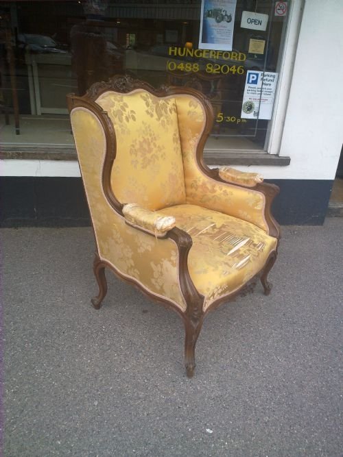 Large Carved Walnut Wing Chair