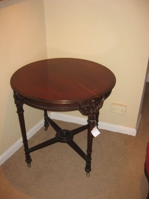 Round Mahogany Table with Classical Decoration