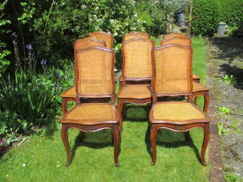 Eight French Cane Chairs