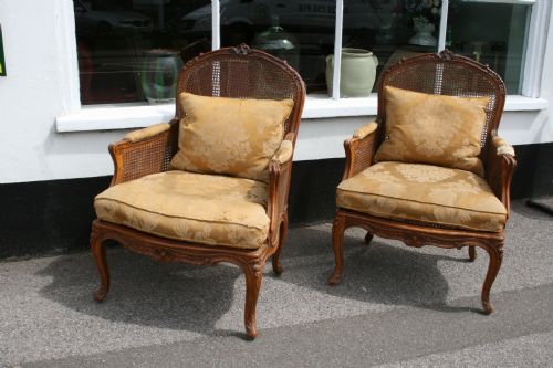 Pair of Large Caned Bergere Armchairs