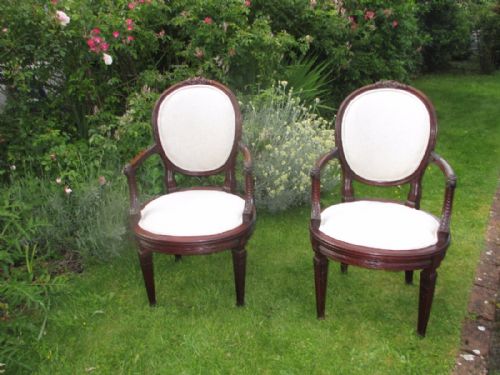 Pair of Carved Mahogany Armchairs