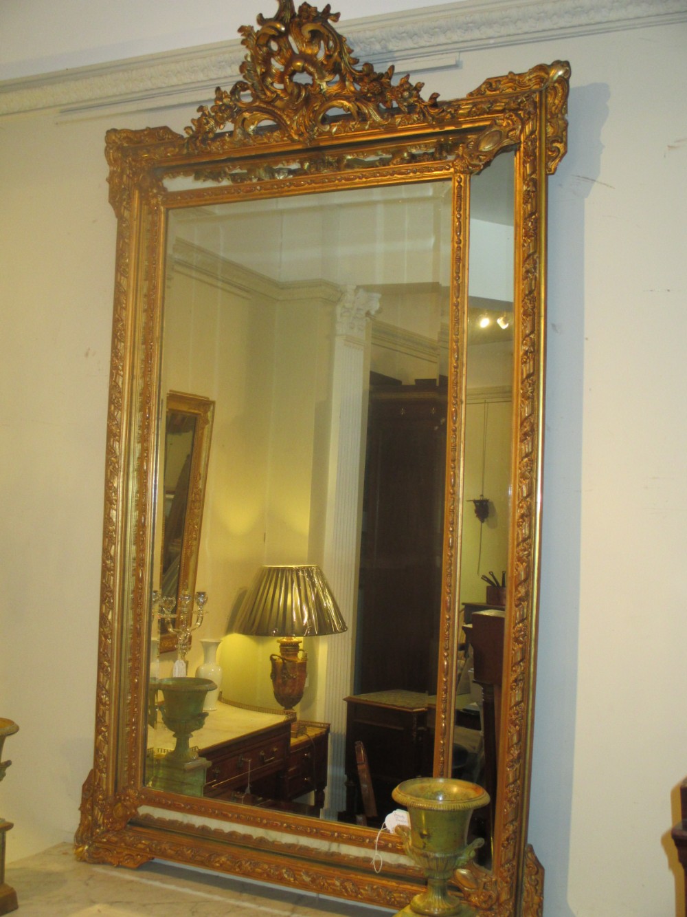 A large paneled French Mirror
