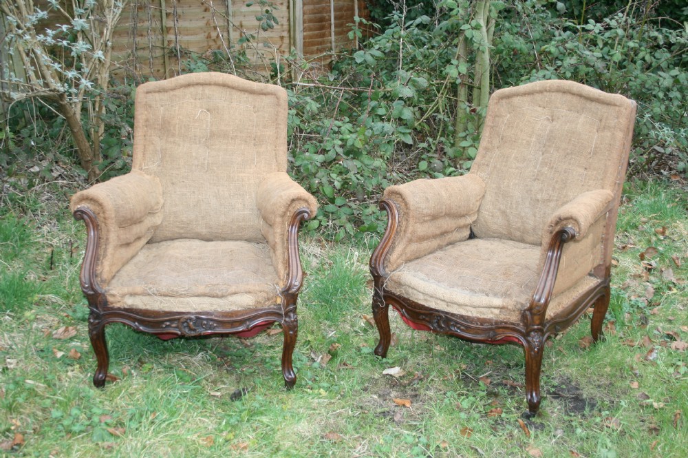 pair of walnut french armchairs