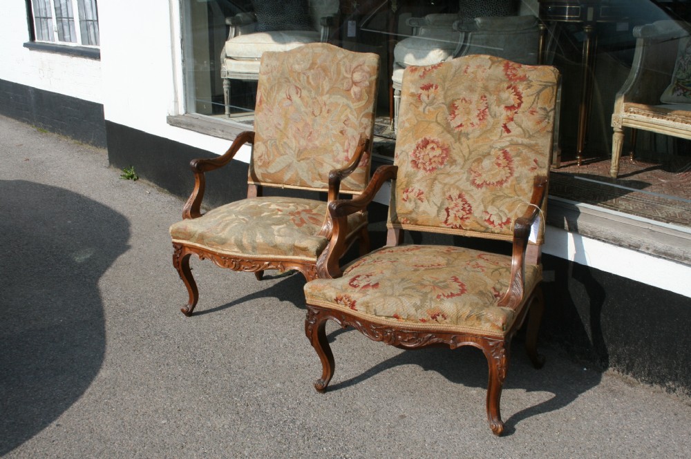 pair french regence style armchairs in walnut 