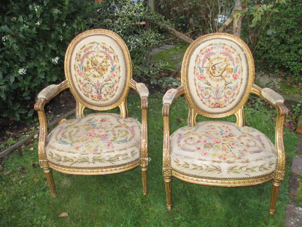  Pair of French gilt armchairs