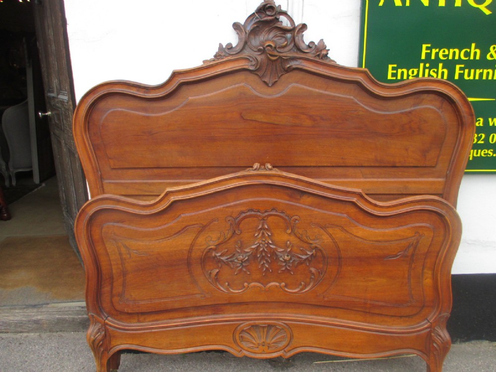 French Carved walnut bed