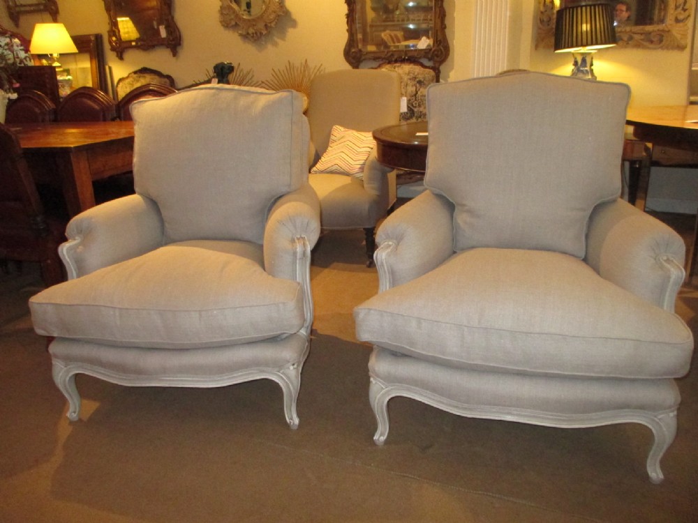 Pair of large upholstered armchairs