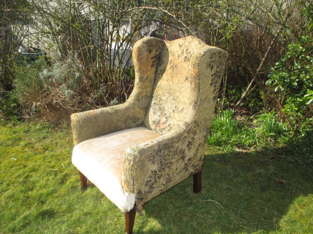 Large wing-back armchair