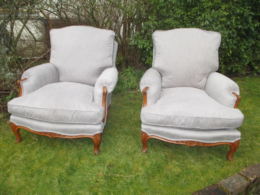 Large pair of upholstered Bergere armchairs