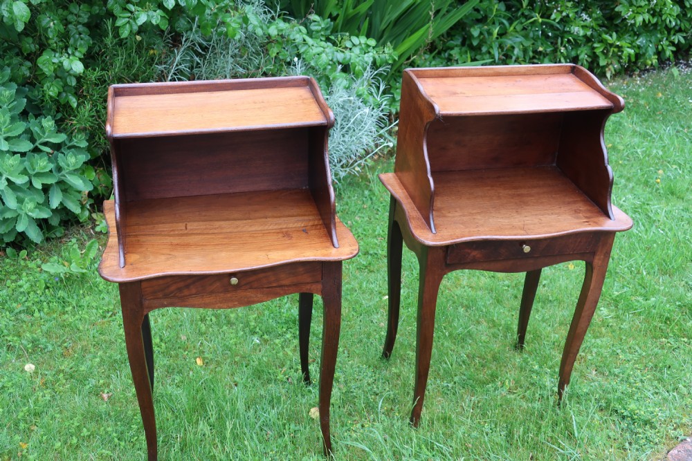 Pair of French walnut bedside tables