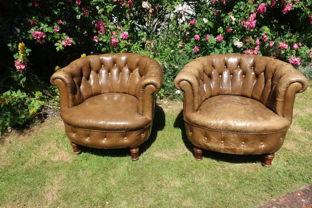 Pair of button-back leather tub chairs View II
